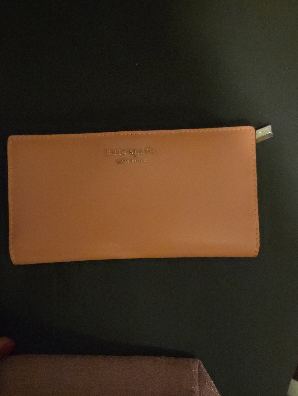 kate spade tan zip-around continental wallet